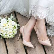 bouquet with brides feet, how to save for a wedding